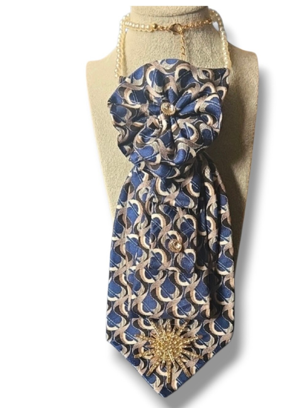 3/$60 Blue Tan & Cream Patterned Folded Cravat  with Gold Starburst Brooch
